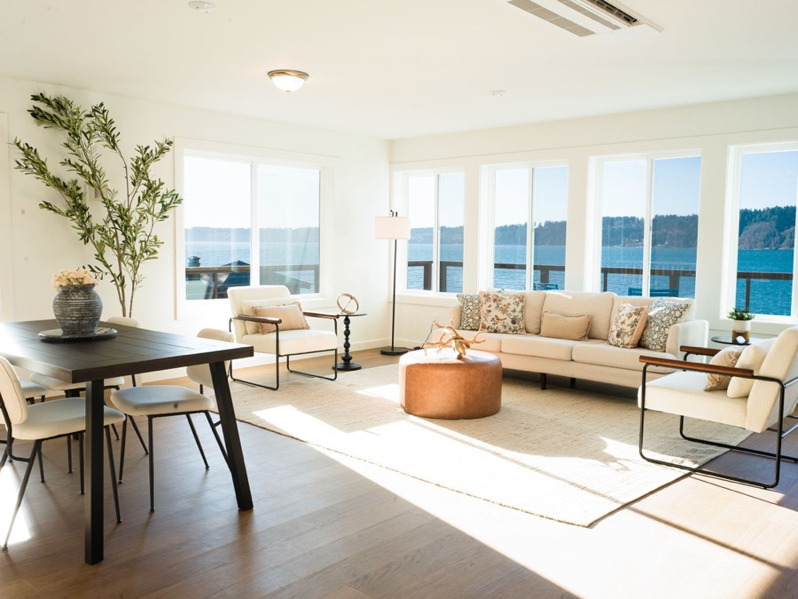 Bright waterfront living room at Spring Beach